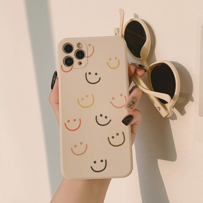 Funda de iPhone de silicona suave con sonrisa colorida
