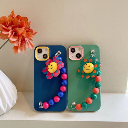 Cubierta colorida de la caja del iPhone de la pulsera de la flor del sol de la sonrisa del grano