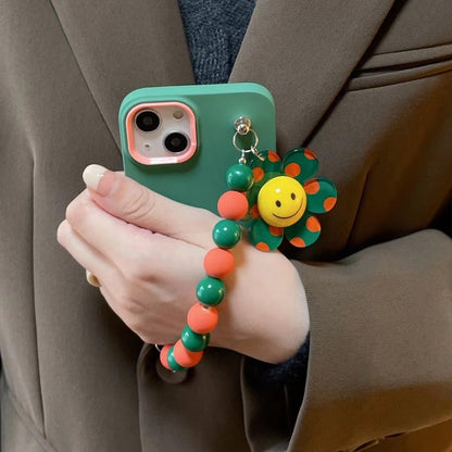 Cubierta colorida de la caja del iPhone de la pulsera de la flor del sol de la sonrisa del grano