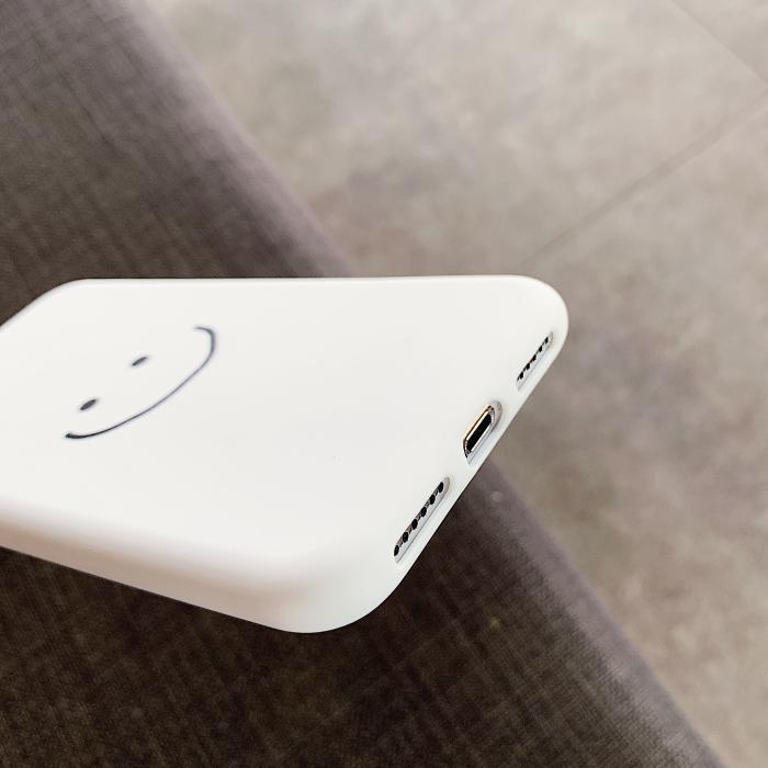 Funda de silicona suave para iPhone con cara sonriente de color sólido